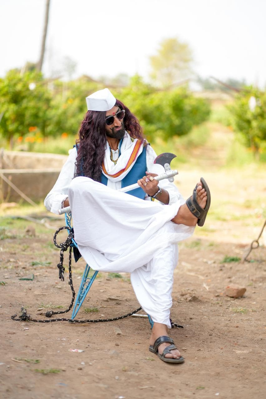 Bablu Patil in a signature comic-style character pose.